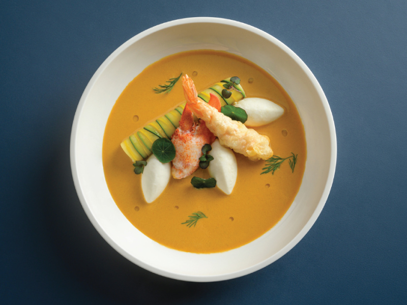 Chef David's Shellfish Bisque accompanied with Fish Dumplings and Cannelloni  of Zucchini  